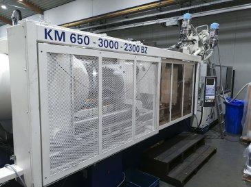 Left view 1 of Krauss Maffei 650-3000-2300 BZ Machine