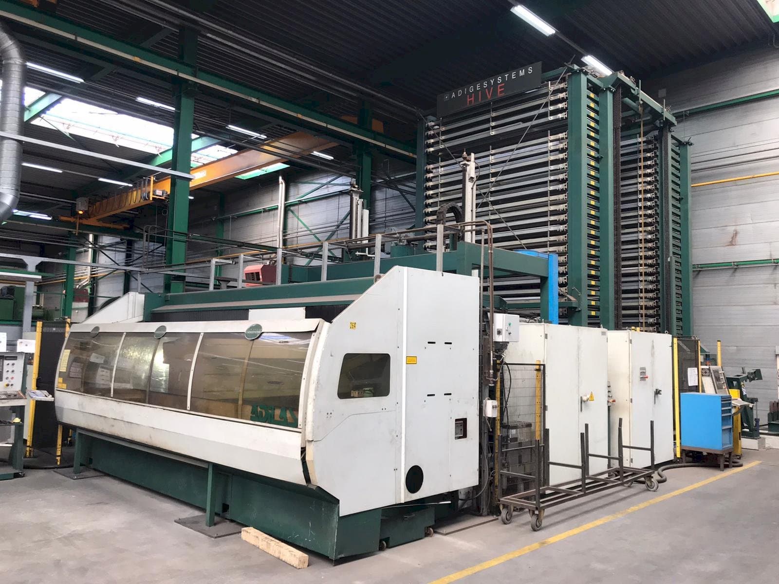 Front view of BLM Adige Adilas 3,2kW CO2 laser 3015 + automation  machine